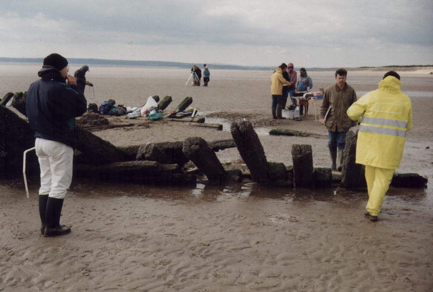 Surveying on Cefn Sidan Sands in 1996